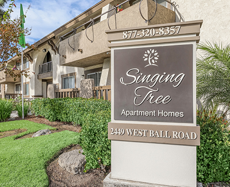 Singing Tree Apartment Homes Accent Image