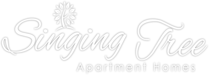 Singing Tree Apartment Homes Logo
